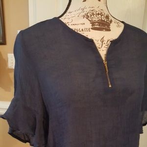 Navy blouse gold zipper at chest ruffled short sle